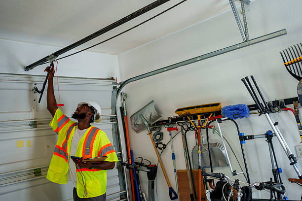 Professional Garage Door Panel Replacement technician working in Minot, ND